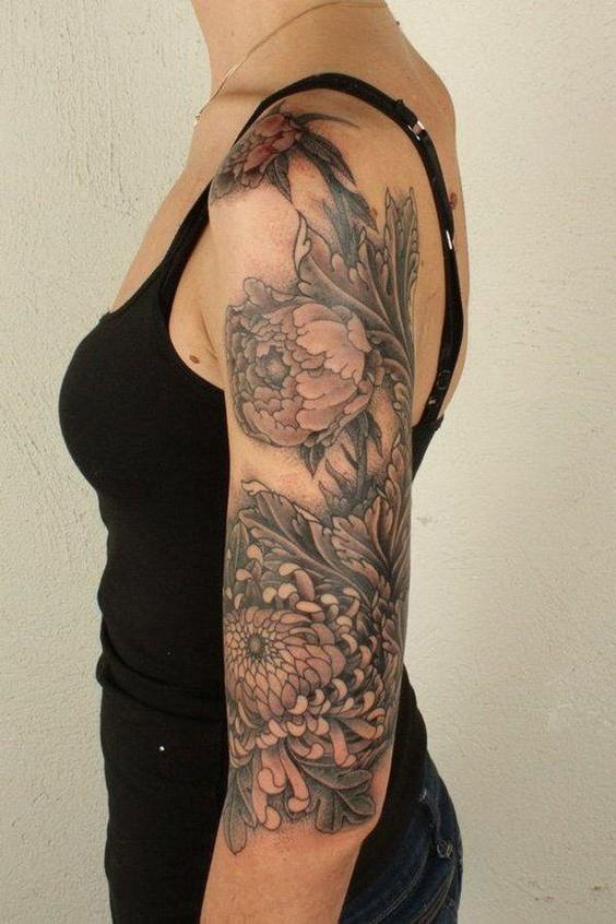 Chrysanthemum sleeve tattoo for girls.