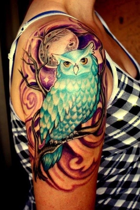 Colorful owl on branch with moon tattoo on girl right shoulder.