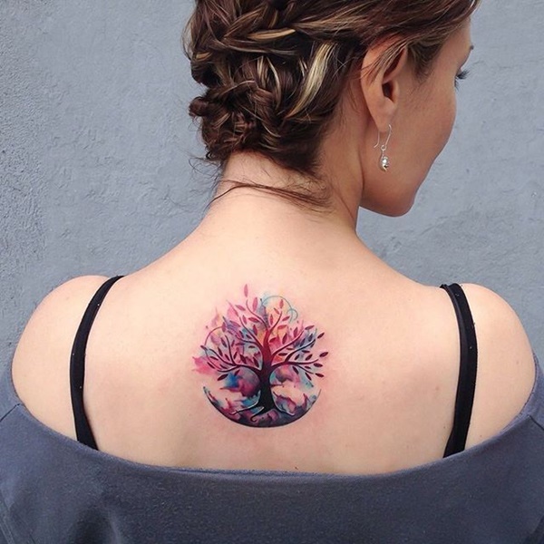 Colorful tree tattoo on back.