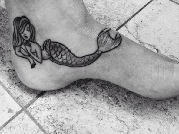 Cute mermaid on foot.