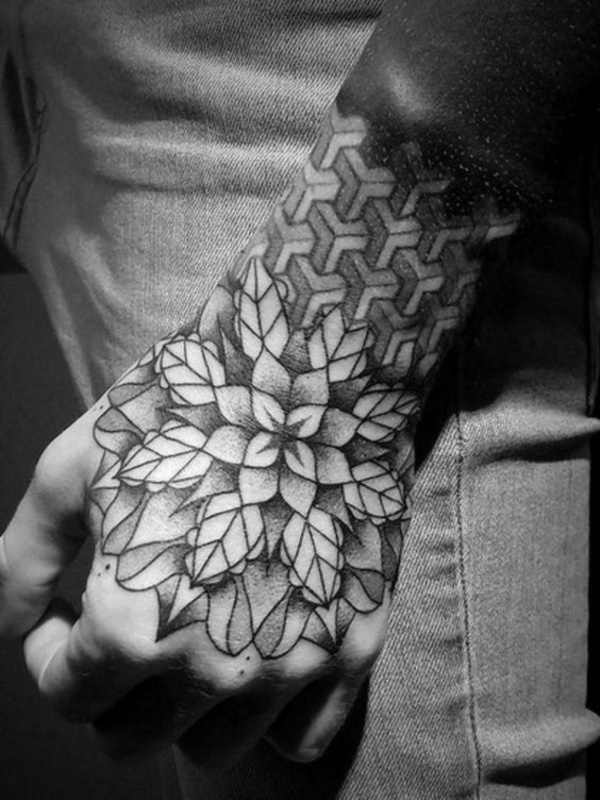 Decor your hand with grey and black flower tattoo design in case you need something unique.