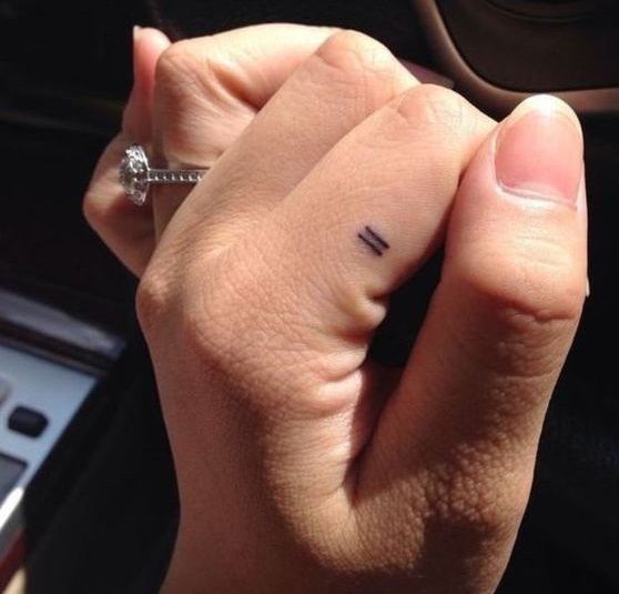 Delicate finger tattoo for you.