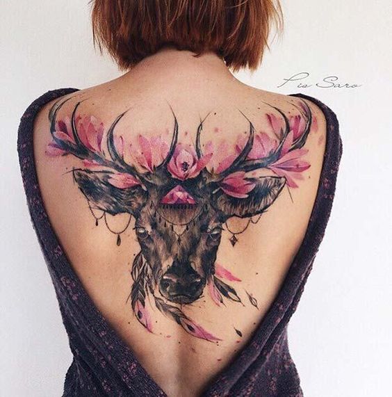 Exclusive black deer tattoo with pink flowers.