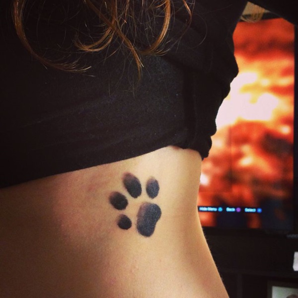 Exclusive dog paw print tattoo.