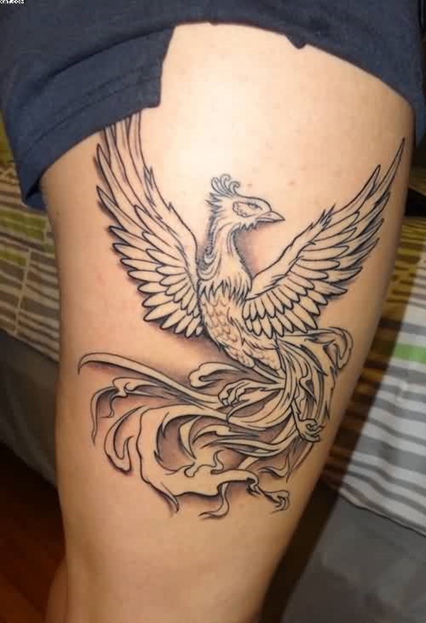 Exclusive phoenix tattoo on thigh.