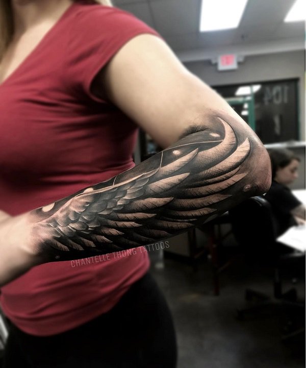Fabulous Wing Sleeve Tattoo.