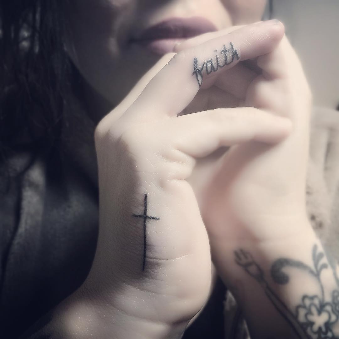Faith and cross cute finger tattoos designs.
