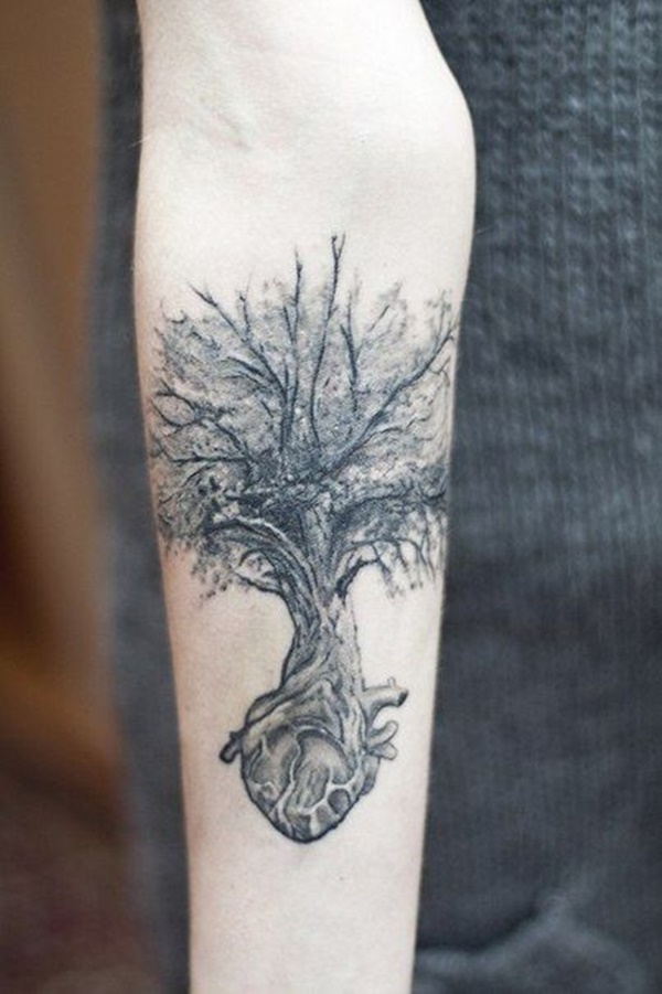Fantastic tree tattoo which roots resembles with human heart.