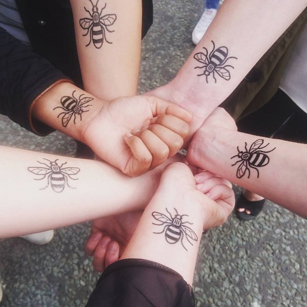 Group of bee tattoos.