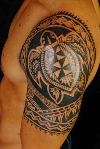Hawaiian tribal tattoos for men on shoulder and half sleeve.