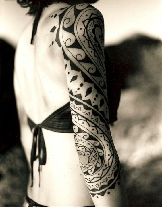 Her sleeve reminds of indigenous art.