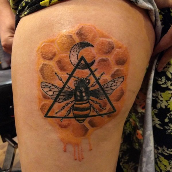 Honey dripping honeycomb maze bee tattoo.