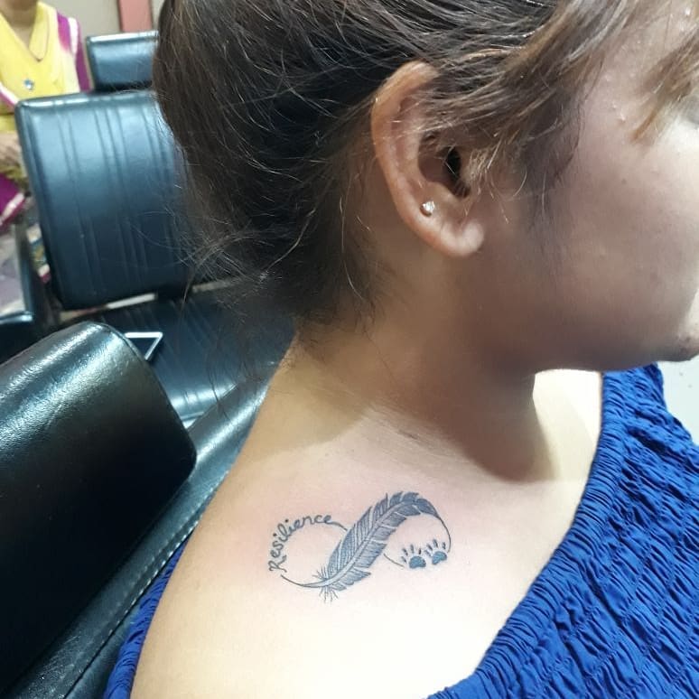 Infinity Feather Dog Paw Shoulder Tattoo.