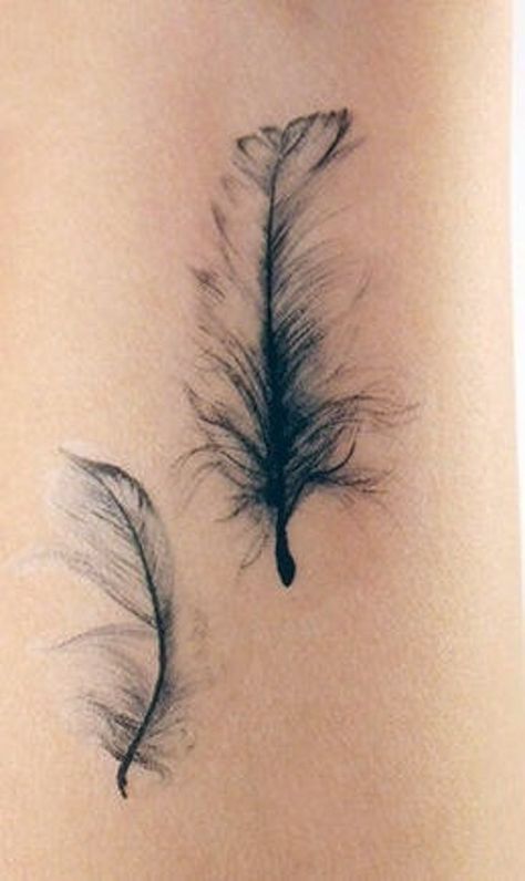 Light feather tattoo idea.