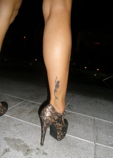 Little mermaid tattoos ideas for leg.