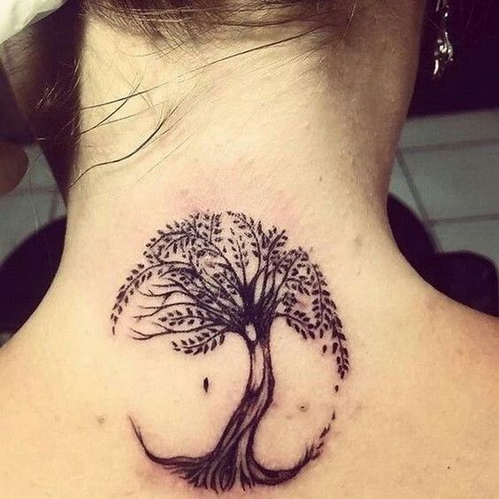 Marvelous tree tattoo on neck.