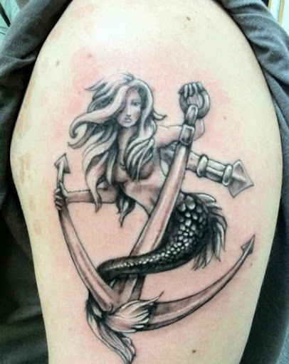 Mermaid Tattoos designs with anchor.