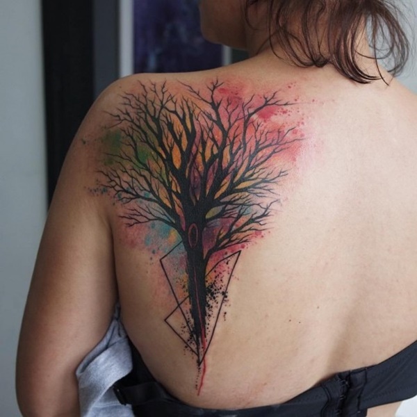 Multicolor tree tattoo looks like painting.