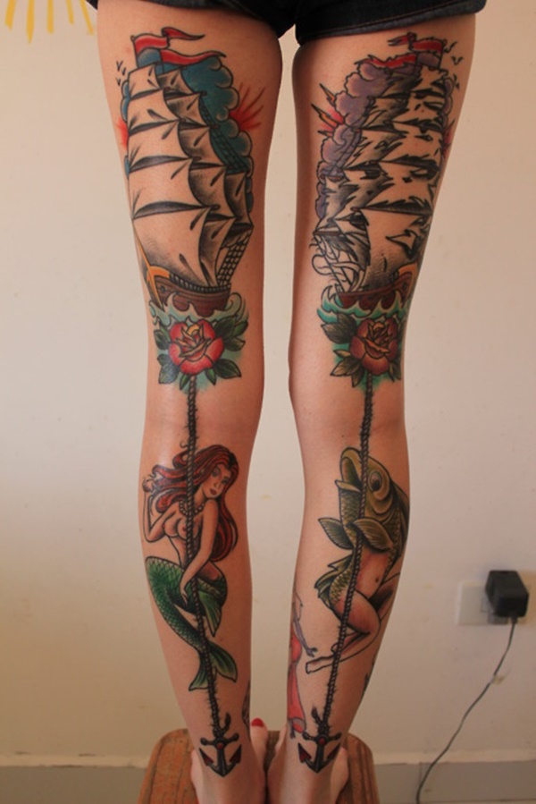 Nautical themed leg tattoos.