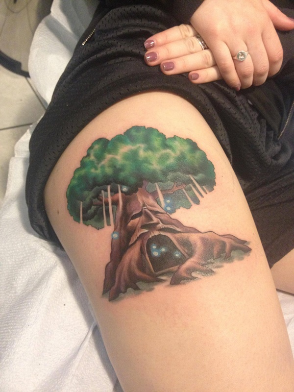 Nice tree house tattoo on thigh.