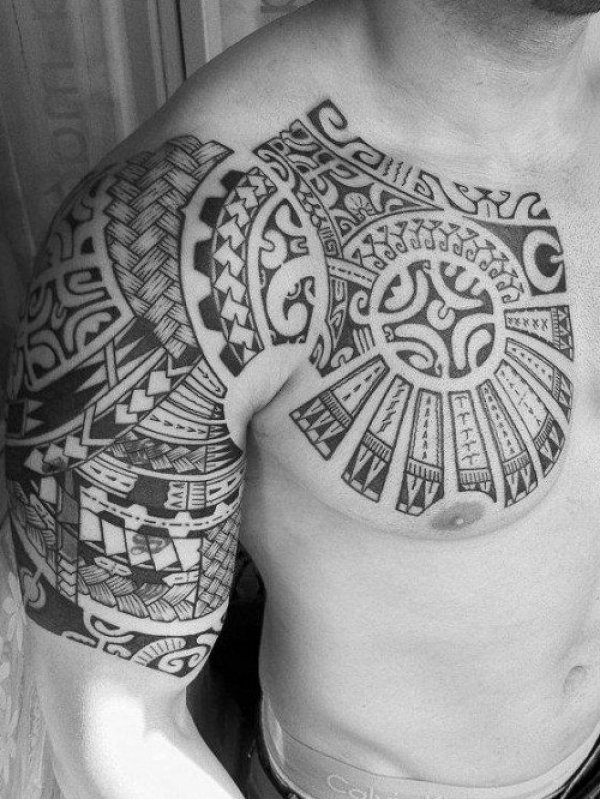 Polynesian tribal design on chest.