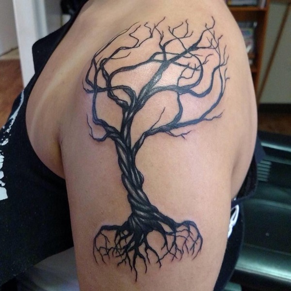 Pretty dead tree tattoo on shoulder.