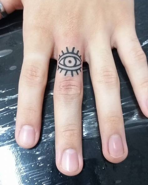 Ring tattoos done to symbolize your love.