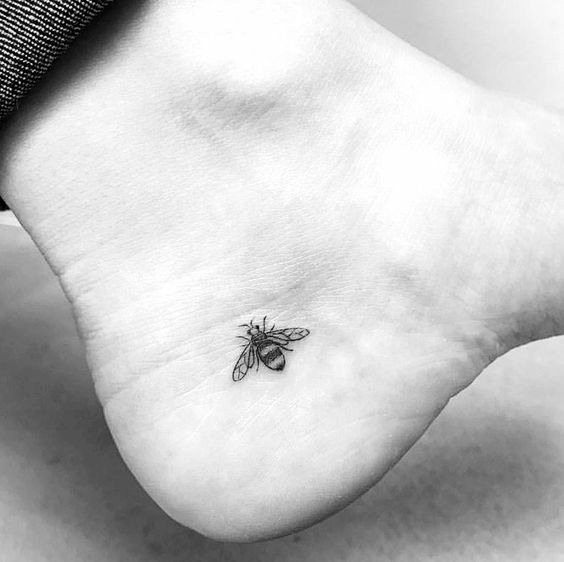 Small bee heal tattoo.