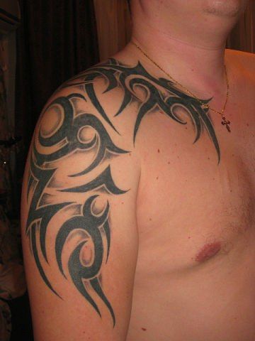 Tribal neck and shoulder tattoo.