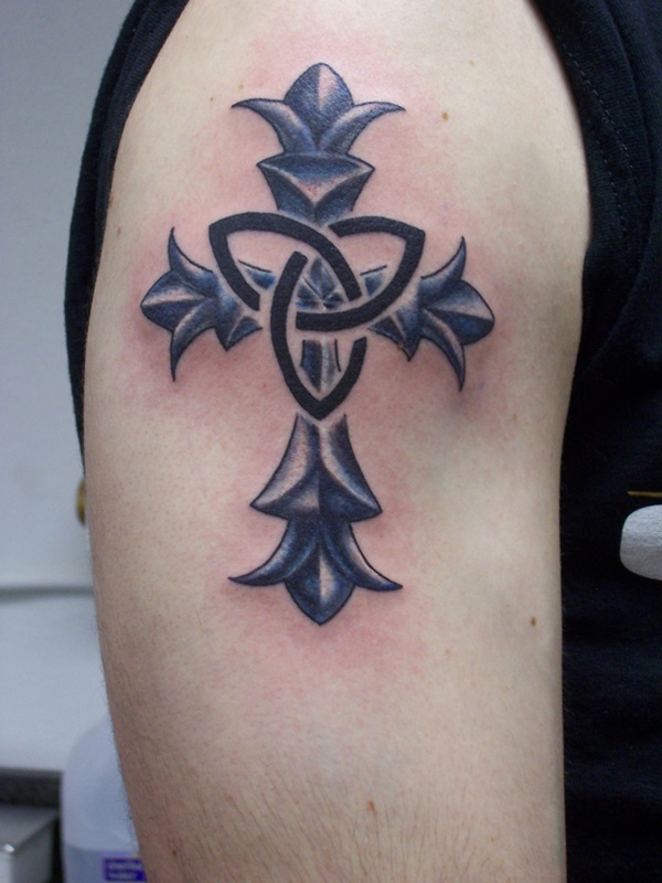 Unique kind of celtic tattoo with cross.