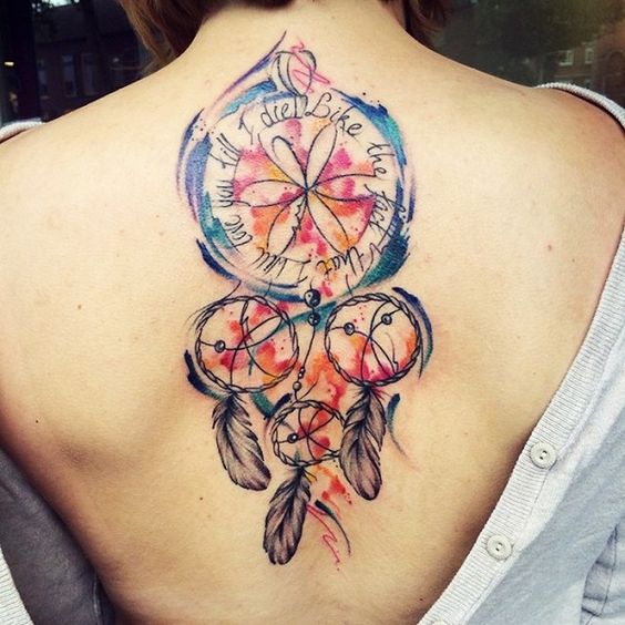 Watercolor dreamcatcher tattoo on back.