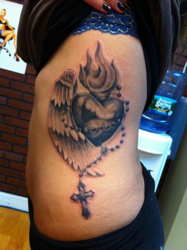 Angel wings fire and a cross This master piece has a deep meaning if you got it.