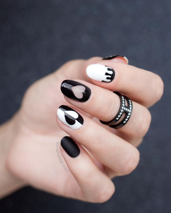 Black and white heart nails.