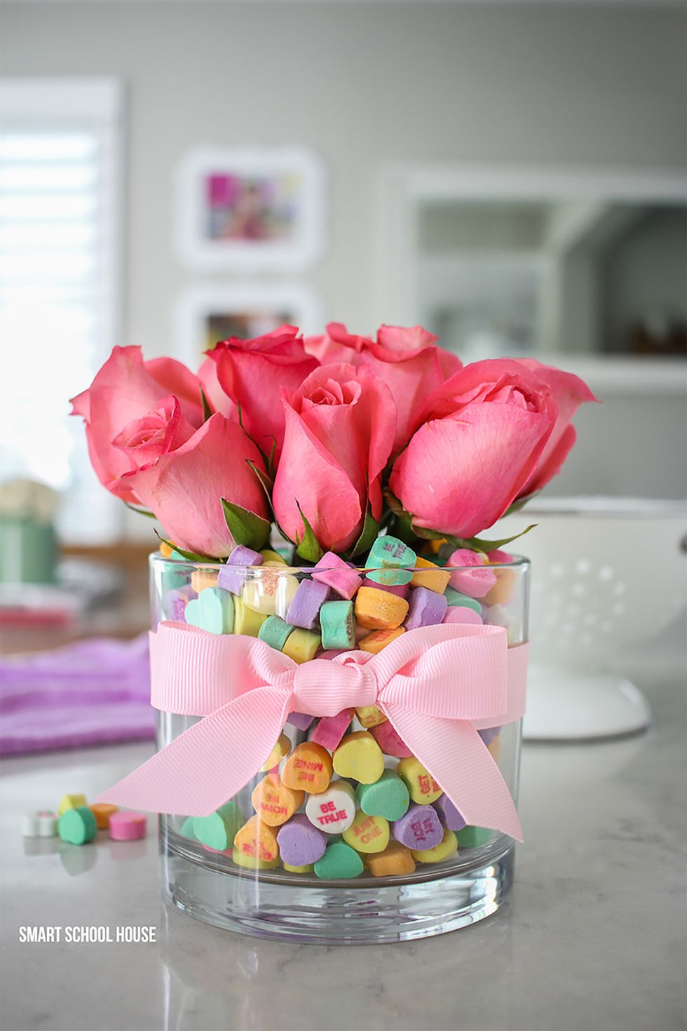 Conversation heart candy filled in vase for flower decor.