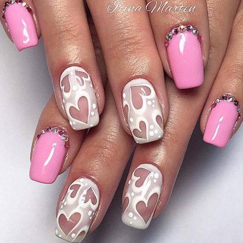 Lovely pink nails with hearts. Valentine’s Day Nail Art