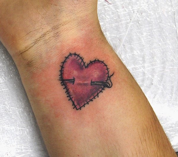 This design looks like if someone has sewed heart on skin.