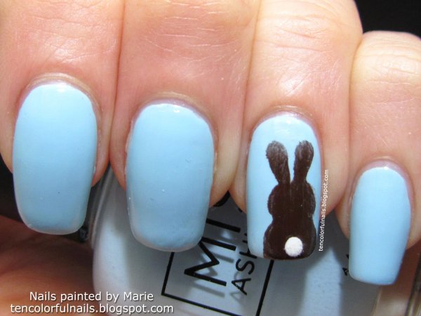 Dashing aqua nails with bunny.