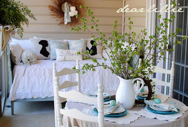 Easter table filled with playful shades of blues, intermingled with green and white.