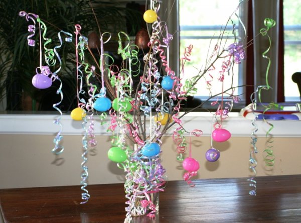 Easter tree is decorated with eggs and ribbons.