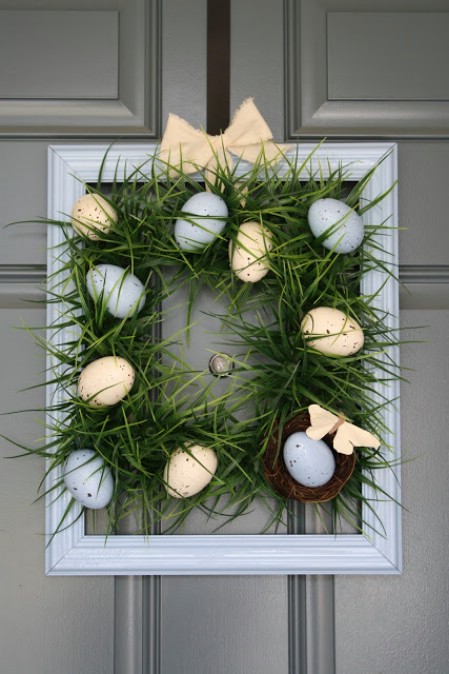 Square grass wreath with easter eggs.