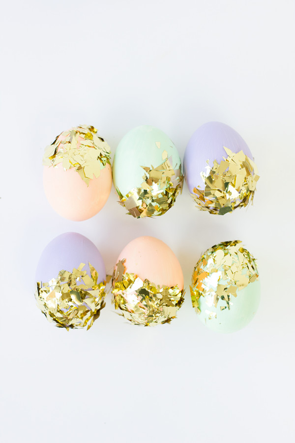 Stunning glitzy gold confetti dipped pastel eggs.