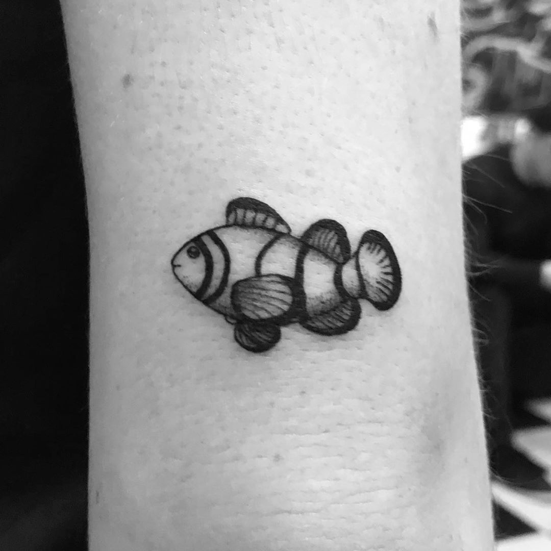 Adorable clown fish tattoo design.