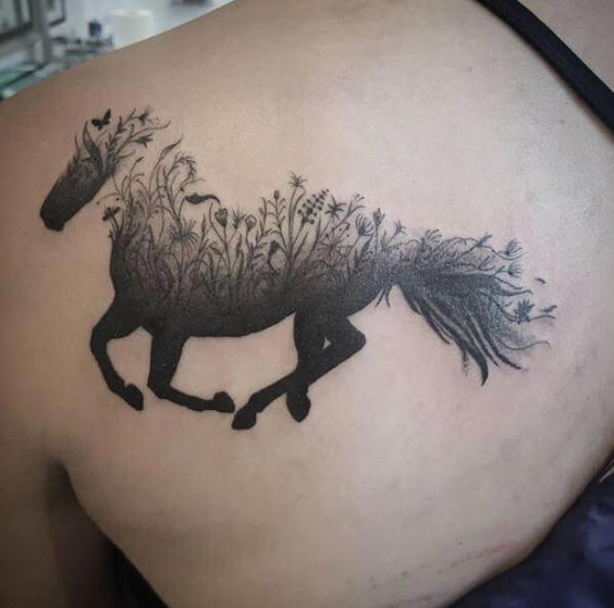 Amazing nature inspired horse tattoo on shoulder.