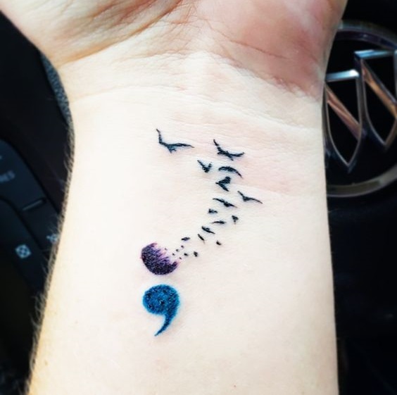 Amazing semicolon awareness wrist tattoo.