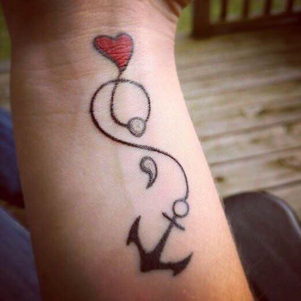 Anchor tattoo symbolizing salvation and hope, combining it with the semicolon shows a powerful image.