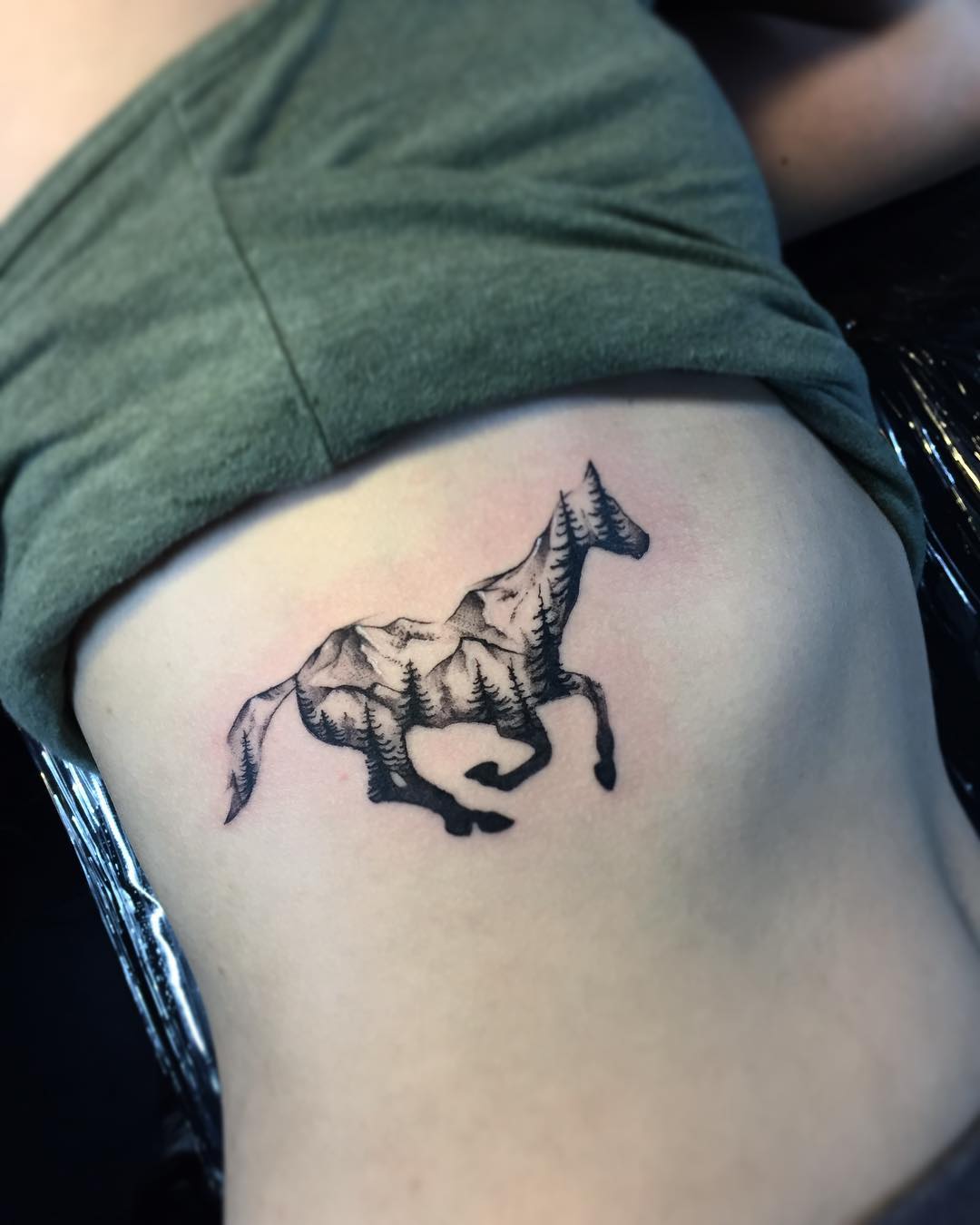 Artistic horse tattoo for nature lover.