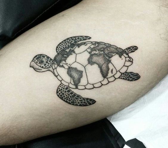 Beautiful world map on a sea turtle's shell tattoo.