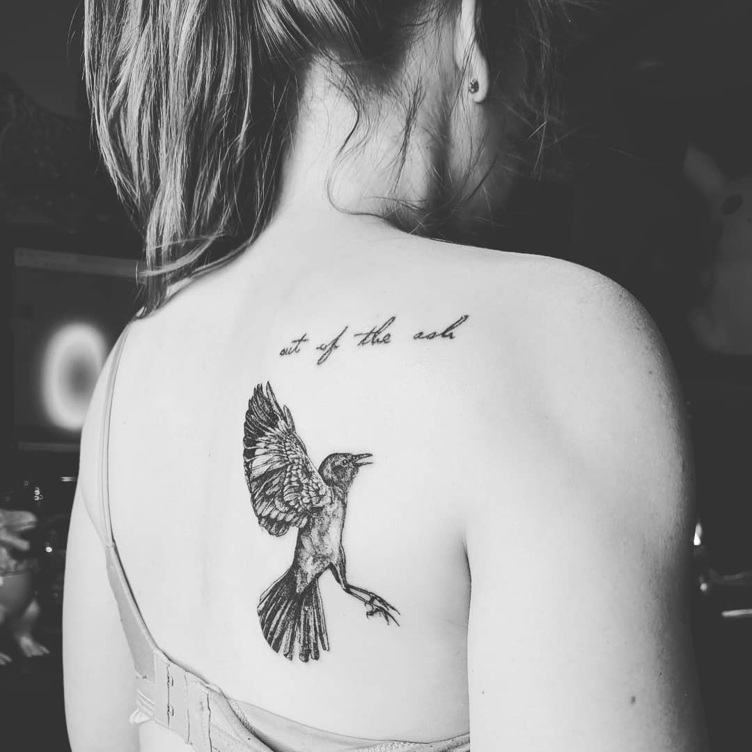 Bird with quote on back.