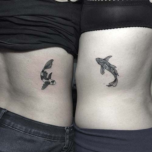 Couple koi fish tattoos.