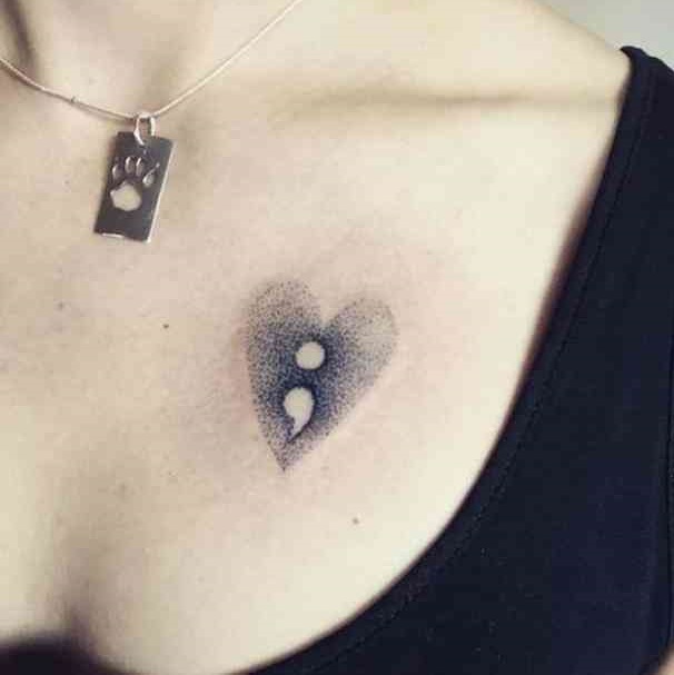 Dotwoek heart tattoo with semicolon.